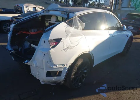 2022 Tesla Model Y Long Range Dual Motor All-Wheel Drive from USA, damaged, VIN 7SAYGAEE3NF558560